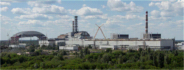 https://upload.wikimedia.org/wikipedia/commons/thumb/7/73/Chernobyl_NPP_Site_Panorama_with_NSC_Construction_-_June_2013.jpg/1280px-Chernobyl_NPP_Site_Panorama_with_NSC_Construction_-_June_2013.jpg